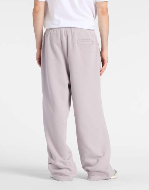 New Balance - Trackside - Broek van fleece in 'truffle salt' grijs, 2 van 4
