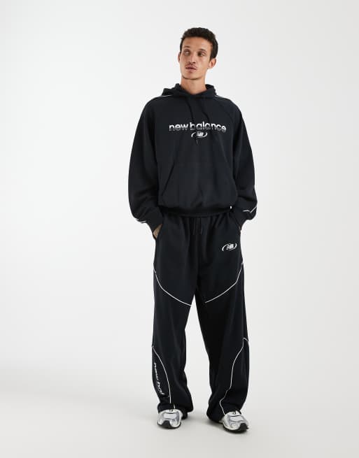 New Balance trackside french terry hoodie in black, 2 of 5