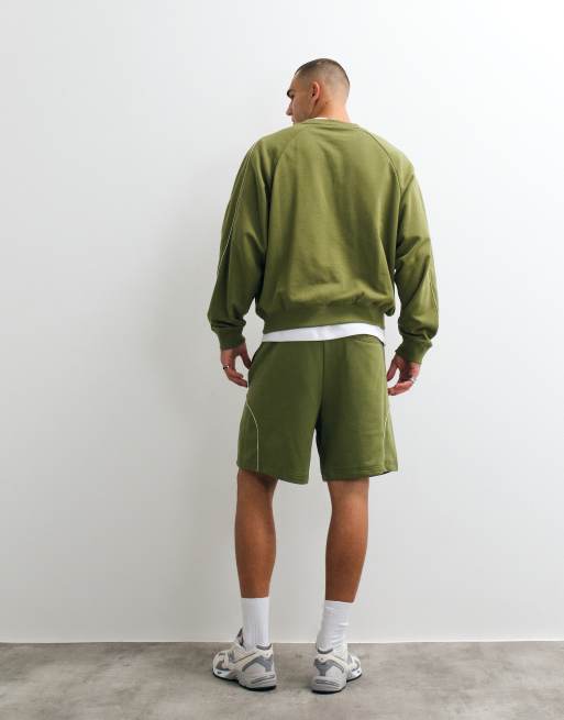 New Balance Trackside french terry short 7" in sport green, 5 of 5