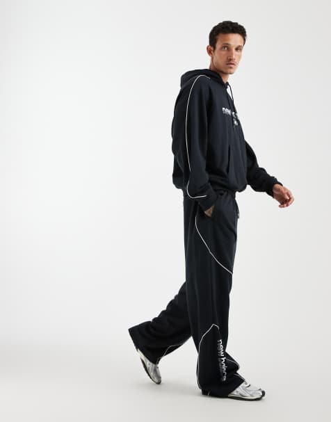 New Balance trackside french terry track pants in black - view 1