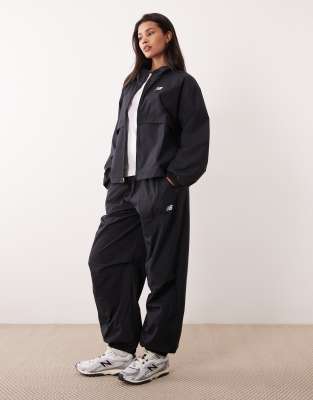 New Balance - Trackside - Hose aus Webstoff in Schwarz