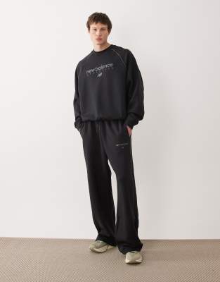 New Balance - Trackside - Pantalon en polaire - Noir