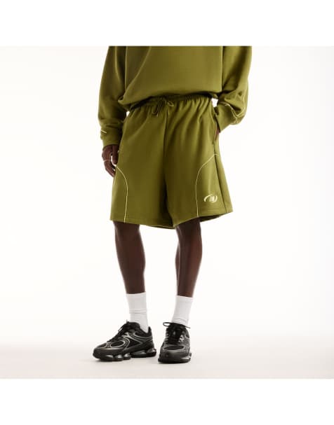 New Balance - Trackside - Pantalones cortos de 7" verde deportivo de felpa rizada - view 1