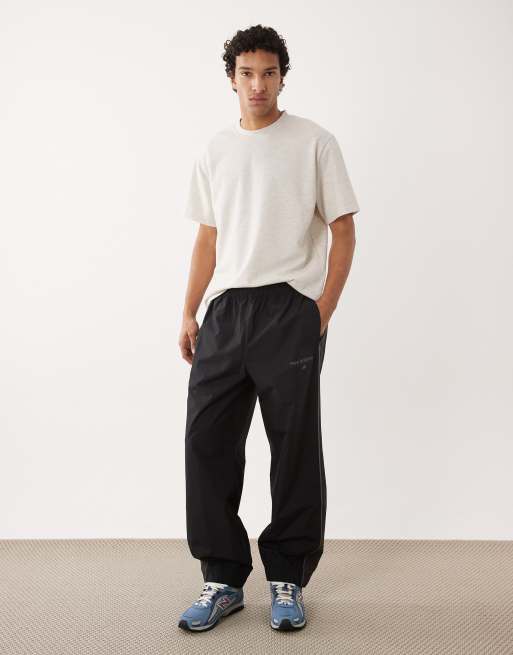 New Balance - Trackside - Pantaloni neri, 2 di 5
