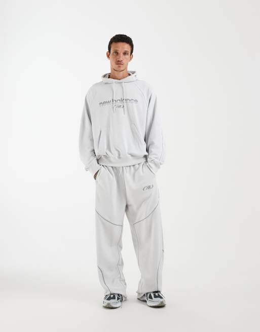 New Balance - Trackside - Sudadera gris con capucha de felpa de rizo, 2 de 5