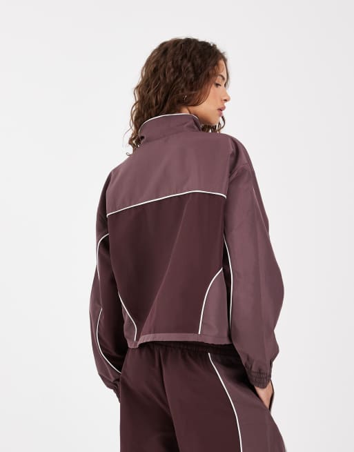 New Balance trackside woven jacket in brown, 4 of 4