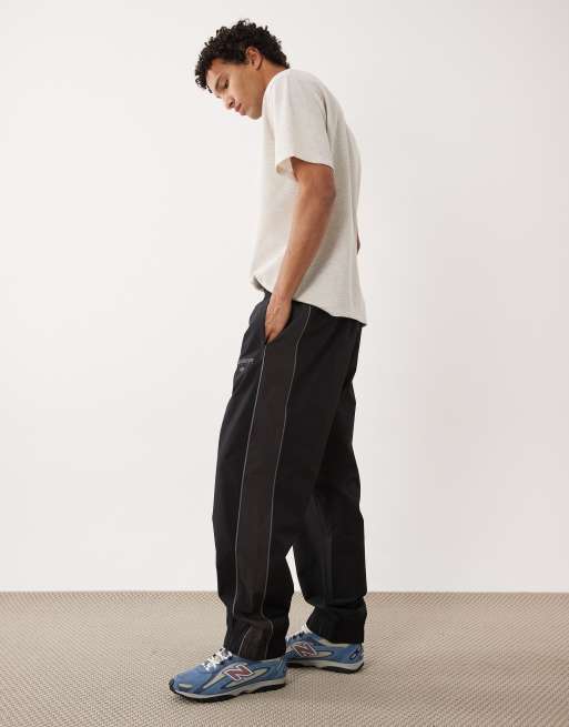 New Balance Trackside woven pant in black, 3 of 5
