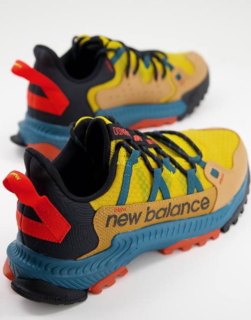 New Balance Trail Shando trainers in orange and blue New Balance Trail Shando trainers in orange and blue