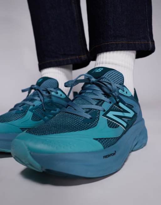 New Balance TRN trainers in blue, 4 of 5