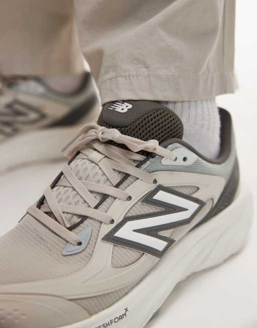 New Balance TRN trainers in off white and beige, 3 of 5