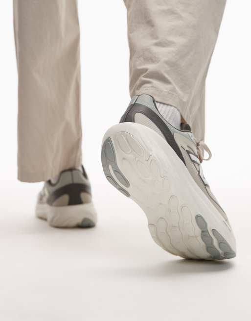 New Balance TRN trainers in off white and beige, 4 of 5