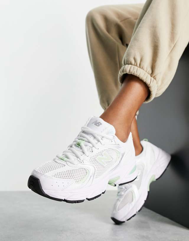 New Balance unisex 530 sneakers in white and pastel green - exclusive to ASOS