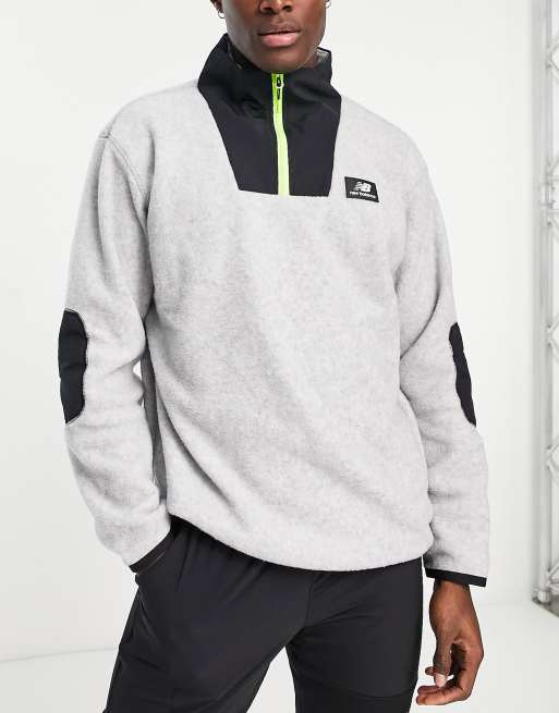 New Balance Unisex All Terrain spinnex 1/4 zip top in grey | ASOS