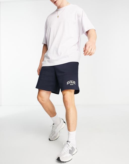 New balance navy shorts hot sale
