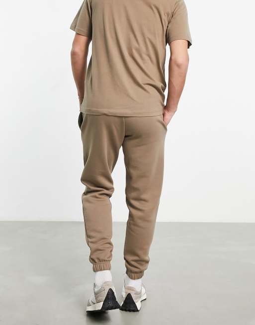 New Balance – Unisex-Jogginghose in Pilzgrau mit „Life in Balance“-Print, 2 von 4