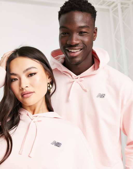 New Balance – Unisex-Kapuzenpullover in Rosa mit Logo und kurzem Schnitt
