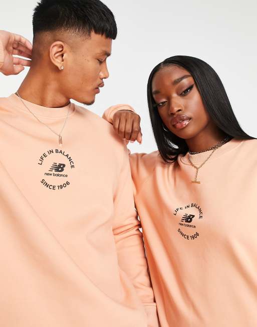 New Balance unisex life in balance sweatshirt in dusty coral ASOS
