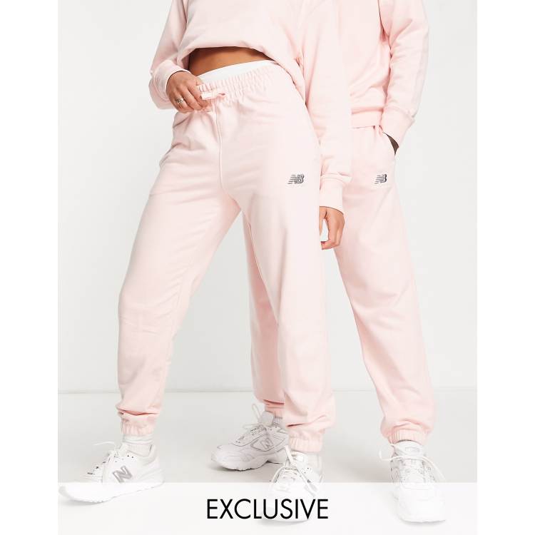 New Balance Unisex logo joggers in pink