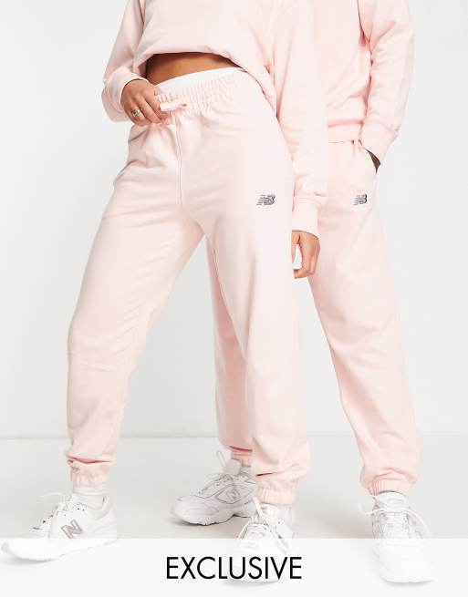 New Balance Unisex logo joggers in pink