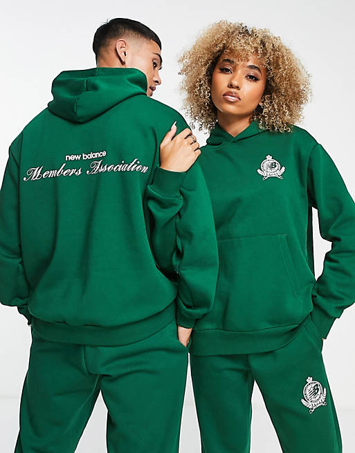 New Balance Unisex members club hoodie in green | ASOS