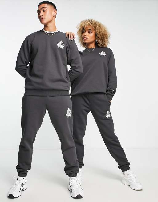 New Balance Unisex members club trackies in black ASOS