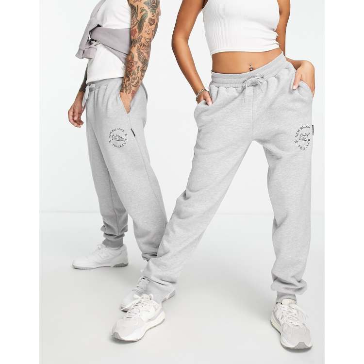 New Balance Unisex runners club joggers in grey - Exclusive to ASOS