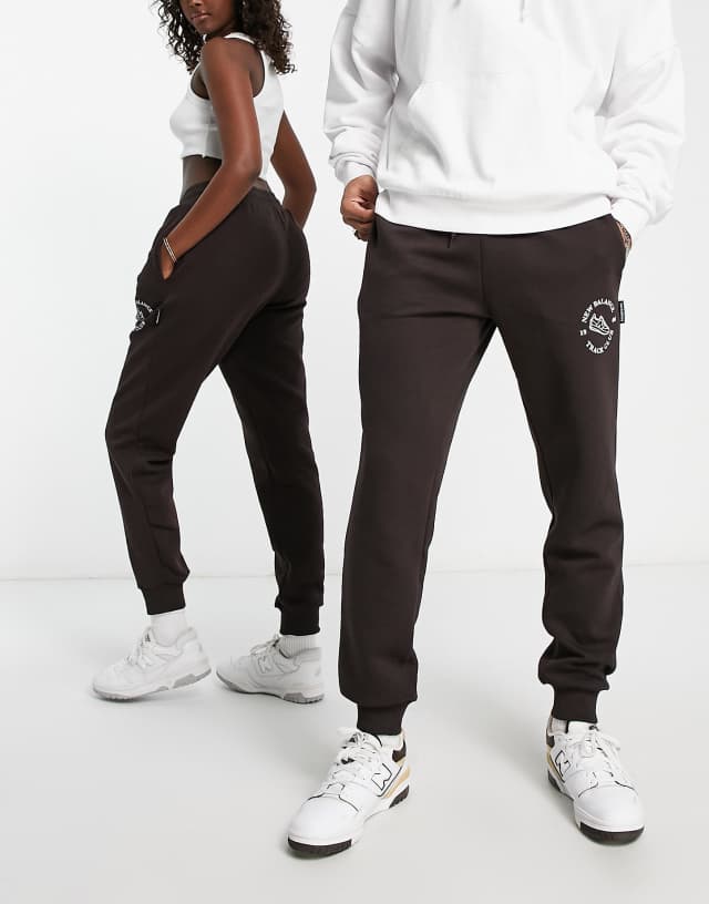 New Balance Unisex Runners Club sweatpants in dark brown - Exclusive to ASOS