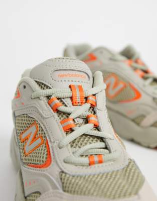 grey orange new balance shoes