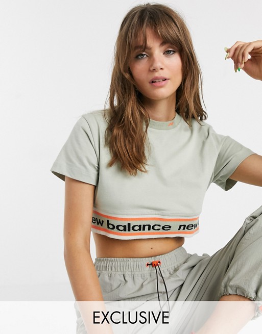 New Balance Utility Pack cropped t-shirt in beige exclusive at ASOS