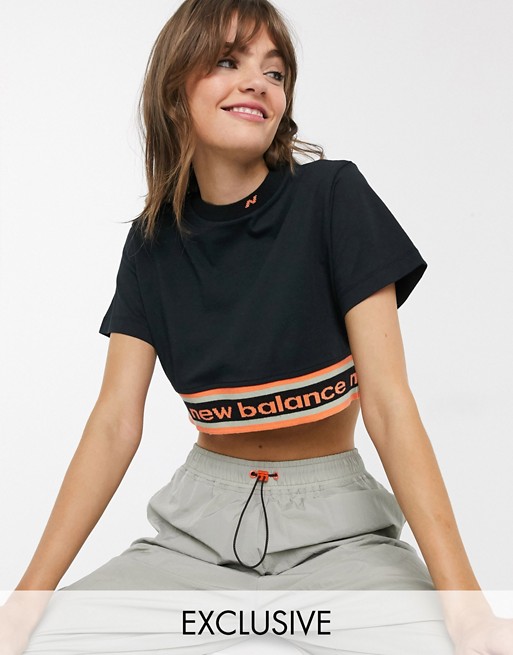 New Balance Utility Pack cropped t-shirt in black exclusive at ASOS