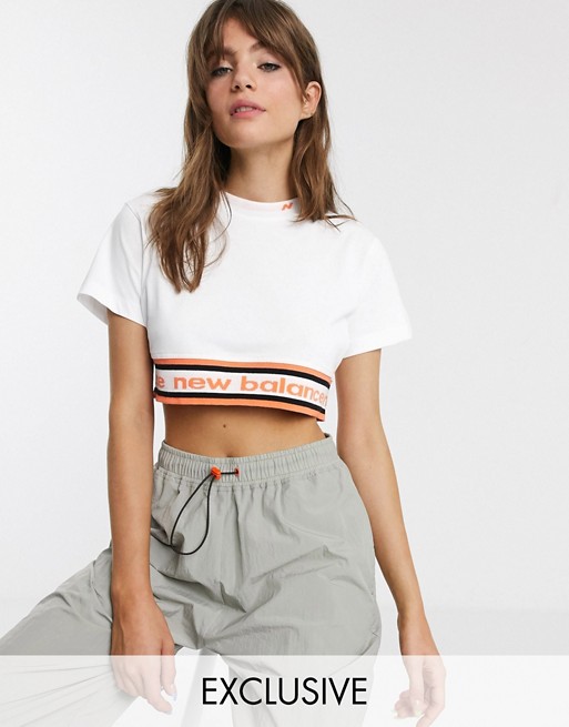 New Balance Utility Pack cropped t-shirt in white exclusive at ASOS