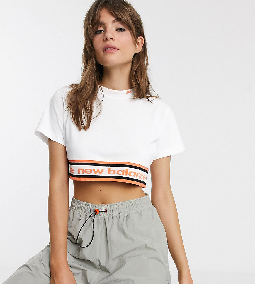 New Balance Utility Pack cropped t-shirt in white exclusive at ASOS