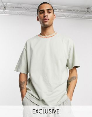 New Balance Utility Pack t-shirt with logo neckline in beige exclusive ...