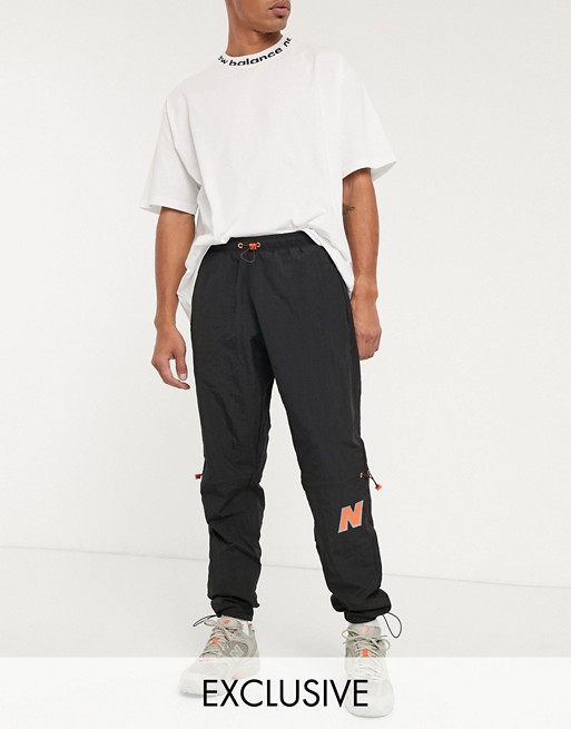 New Balance Utility Pack woven logo utility joggers in black exclusive to ASOS