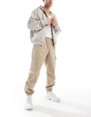 New Balance Men's Neutral Vip Twill Cargo Joggers Beige