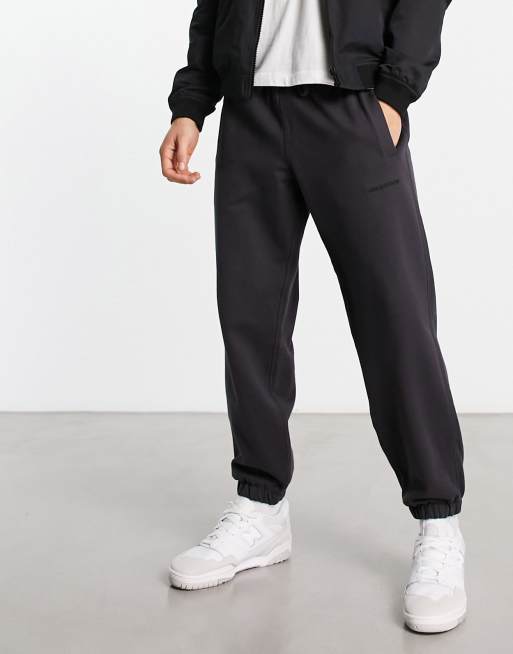 New Balance washed trackies with logo in washed grey