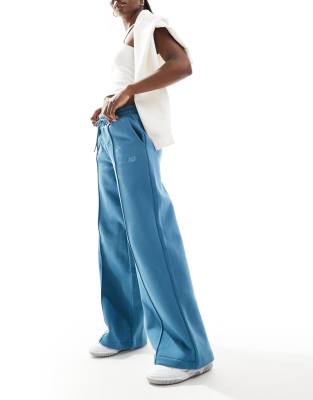 New Balance - Weit geschnittene Hose aus Fleece in Blau