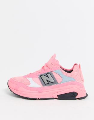 bright pink new balance shoes