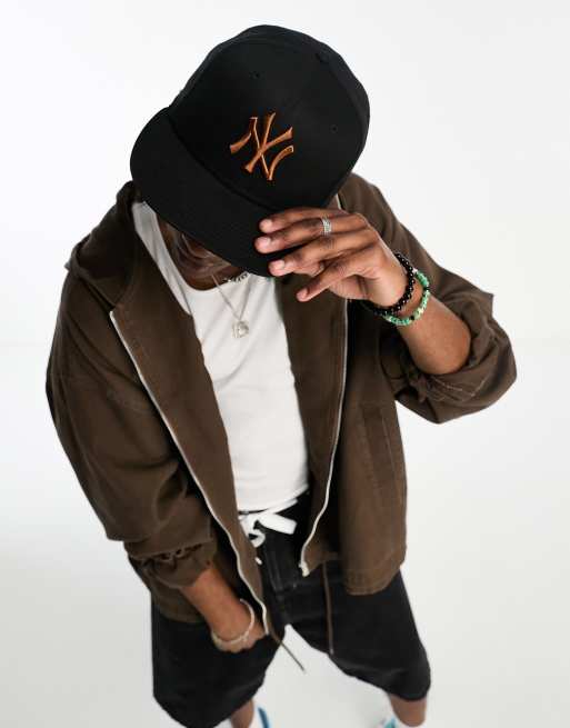 New Era – 9Fifty – Schwarze Kappe mit „NY“-Logo in Orange