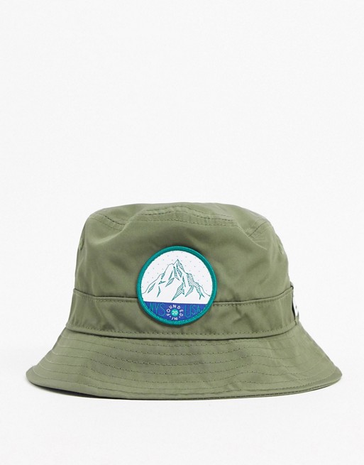 New Era bucket hat in green with embroidery