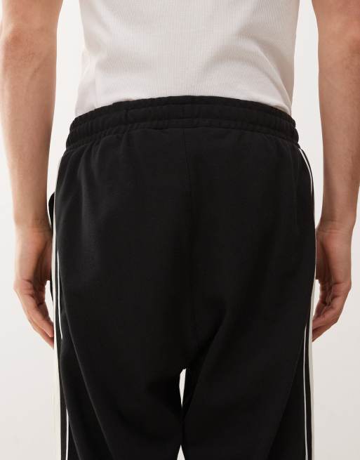 New Era – Chicago Bulls – Gerade geschnittene Jogginghose in Schwarz, Kombiteil, 4 von 5