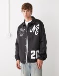 [New Era] New Era coach jacket in black with multi badging and embroidery M MULTI