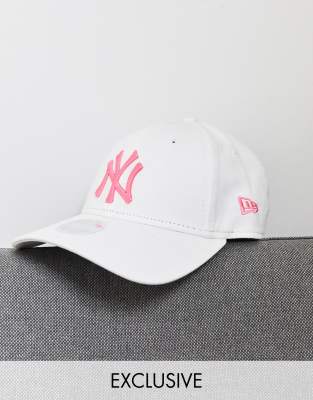 white and pink hat