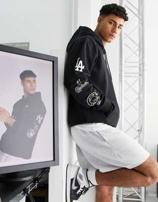 New Era – Kapuzenpullover in Schwarz mit Multi-Team-Print auf dem Ärmel