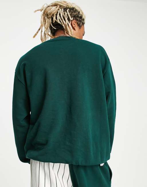 New Era LA Dodgers pinstripe hoodie in green exclusive to ASOS