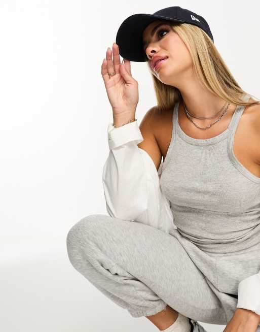 New Era LA mini logo cap in navy Exclusive at ASOS | ASOS