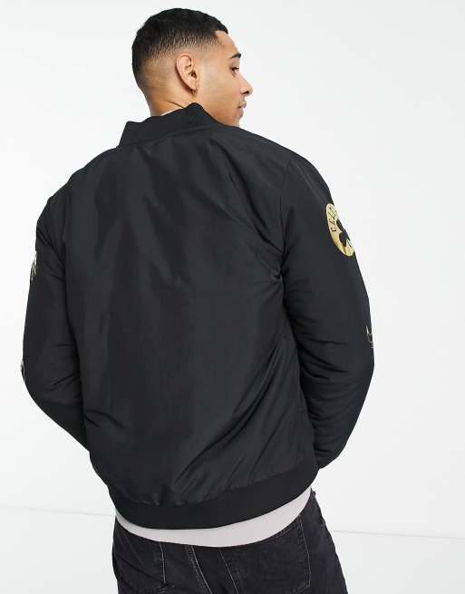 New Era NBA gold foil sleeve printed bomber jacket in black ASOS