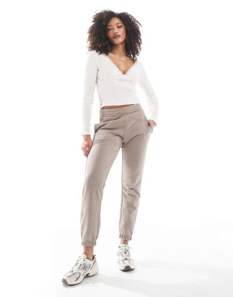 New Era New York embroidered logo cuffed trackies in taupe - view 1