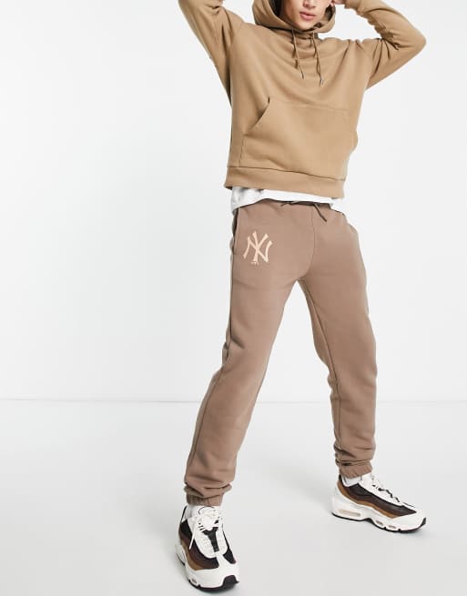 New Era New York Yankees relaxed fit joggers in brown ASOS