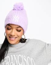 ASOS DESIGN cable knit beanie with faux fur pom in sage